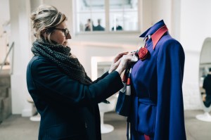 Pascaline Chavanne fits a design for “Becoming Karl Lagerfeld”