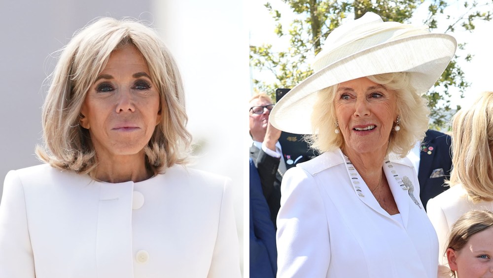 King Charles III and Queen Camilla walk with France's President Emmanuel Macron (2nd R) his wife Brigitte Macron as they pass the memorial wall at the UK Ministry of Defence and the Royal British Legion’s commemorative event at the British Normandy Memorial to mark the 80th anniversary of D-Day on June 6 in Ver-Sur-Mer, France.