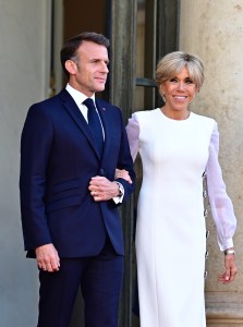 PARIS, FRANCE - JUNE 8: French President Emmanuel Macron and Brigitte Macron arrive to welcome US President Joe Biden and first lady Jill Biden at Elysee Palace on June 8, 2024 in Paris, France. U.S. President Joe Biden is in France to commemorate the 80th anniversary of the invasion of Normandy and to emphasize the continued role of the United States in helping to protect democratic values in Europe.(Photo by Christian Liewig - Corbis/Corbis via Getty Images)