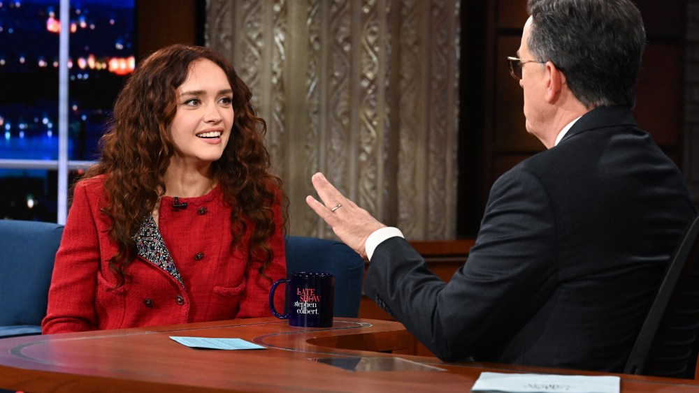 house of the dragon actress Olivia Cooke red chanel tweed dress, left, and Stephen Colbert on the June 4 episode of 'The Late Show With Stephen Colbert.'
