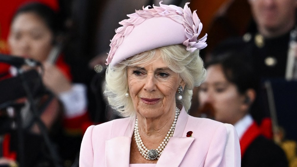 queen camilla, d-day, Britain's Queen Camilla attends the UK's national commemorative event for the 80th anniversary of D-Day, hosted by the Ministry of Defence on Southsea Common on June 5, 2024 in Portsmouth, England, pearl necklace