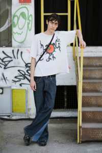 Street style at Milan Fashion Week Men's Spring 2025.