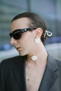 Street style at Milan Fashion Week Men's Spring 2025.