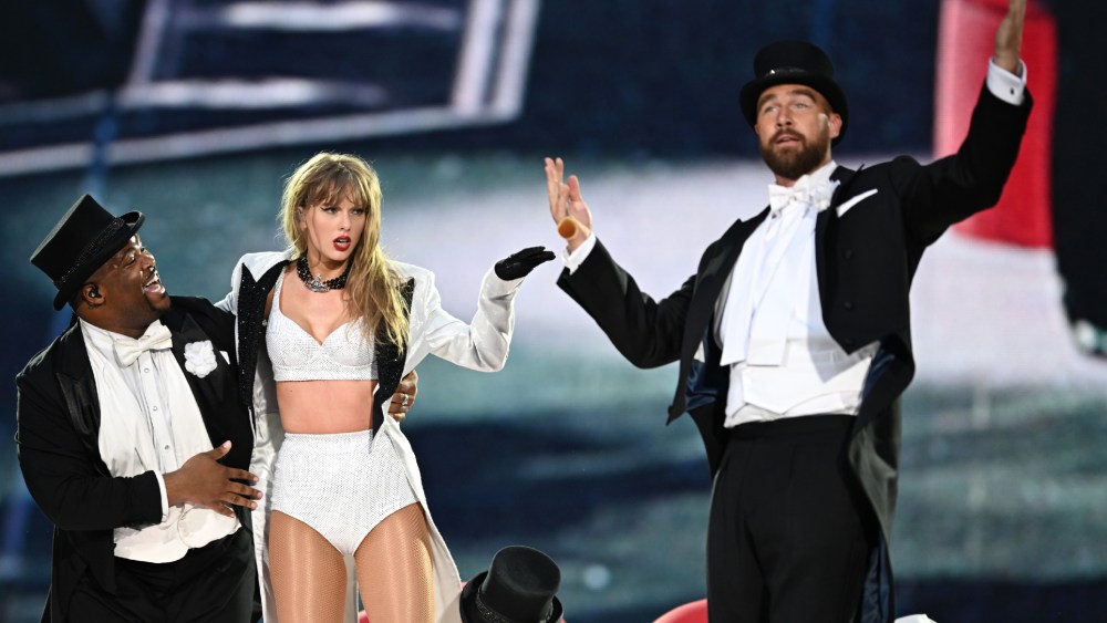 Taylor Swift is joined on stage by Travis Kelce (R), during "Taylor Swift | The Eras Tour" at Wembley Stadium on June 23 in London.