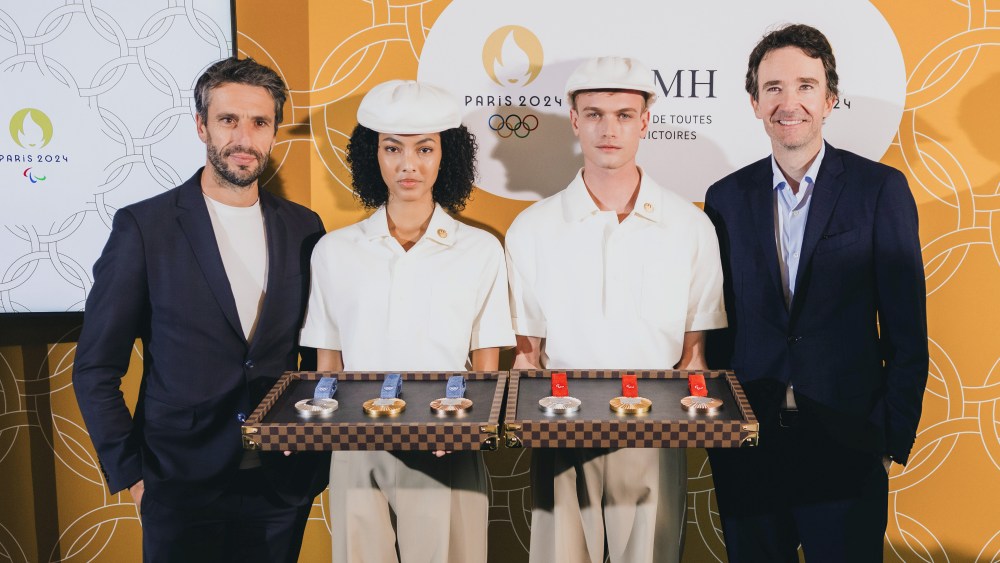 Tony Estanguet, models in Paris 2024 Olympic medal bearers' uniforms, Antoine Arnault.