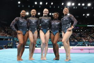 PARIS, FRANCE - JULY 28: (L-R) Jordan Chiles, Hezly Rivera, Jade Carey, Simone Biles, and Sunisa Lee of Team United States pose for a photo during the Artistic Gymnastics Women's Qualification on day two of the Olympic Games Paris 2024 at Bercy Arena on July 28, 2024 in Paris, France. (Photo by Jamie Squire/Getty Images)