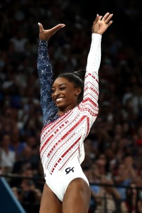 Simone Biles of Team United States reacts after competing on the vault during the Artistic Gymnastics Women's Team Final on day four of the Olympic Games Paris 2024 at Bercy Arena on July 30, 2024 in Paris, France.