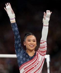 Sunisa Lee of Team United States reacts after finishing her routine on the uneven bars during the Artistic Gymnastics Women's Team Final on day four of the Olympic Games Paris 2024 at Bercy Arena on July 30, 2024 in Paris, France.
