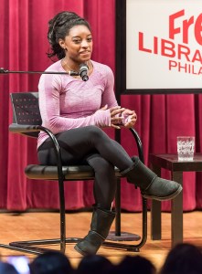 PHILADELPHIA, PA - JANUARY 06:  US Olympic gold medalist, Simone Biles is seen on stage during a Q&A while promoting her new book 'Courage to Soar: A Body in Motion, A Life in Balance' at Free Library of Philadelphia on January 6, 2017 in Philadelphia, Pennsylvania.  (Photo by Gilbert Carrasquillo/Getty Images)