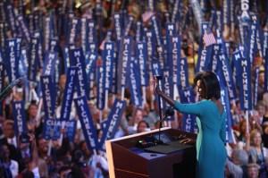 DENVER - AUGUST 25:  Michelle Obama, wife of presumptive Democratic nominee U.S. Sen. Barack Obama (D-IL), waves to the crowd during day one of the Democratic National Convention (DNC) at the Pepsi Center August 25, 2008 in Denver, Colorado. The DNC, where U.S. Sen. Barack Obama (D-IL) will be officially nominated as the Democratic candidate for U.S. president, starts today and finishes August 28th.  (Photo by John Moore/Getty Images)