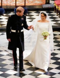 Prince Harry, Duke of Sussex and The Duchess of Sussex depart following their wedding in St George's Chapel at Windsor Castle on May 19, 2018 in Windsor, England.