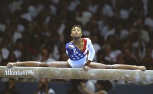 23 Jul 1996: Dominique Dawes of the USA on the beam during the womens team gymnastics event at the Georgia Dome at the 1996 Centennial Olympic Games in Atlanta, Georgia. Mandatory Credit: Doug Pensinger  /Allsport