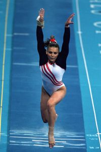19 Sep 2000:  Jamie Dantzscher of the United States runs towards the vault during the Women's Gymnastics at the Sydney Superdome in the 2000 Olympics in Sydney, Australia.Mandatory Credit: Al Bello /Getty Images