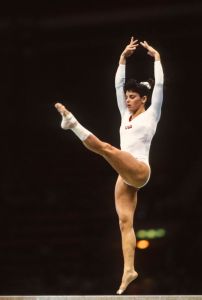 SEOUL, SOUTH KOREA -  SEPTEMBER 1988:  Kelly Garrison-Steves of the USA performs on the balance beam during the Women's Gymnastics competition of the 1988 Olympic Games held during September 1988 at the Olympic Gymnastics Hall in Seoul, South Korea.  (Photo by David Madison/Getty Images)