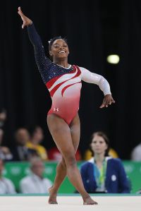 Gymnastics - Olympics: Day 4   Simone Biles of the United States performing her floor routine during the Artistic Gymnastics Women's Team Final at the Rio Olympic Arena on August 9, 2016 in Rio de Janeiro, Brazil. (Photo by Tim Clayton/Corbis via Getty Images)"n"n