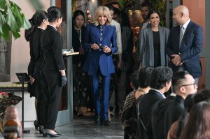 Brigitte Macron (C), wife of France's President Emmanuel Macron, accompanied by Indonesian President Prabowo Subianto's son Didit Hediprasetyo (R) visits the National Museum in Jakarta on May 28, 2025. (Photo by BAY ISMOYO / AFP) (Photo by BAY ISMOYO/AFP via Getty Images)