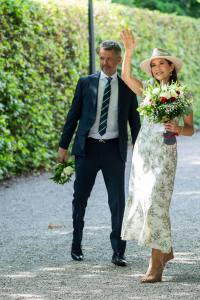 King Frederik X of Denmark and Queen Mary of Denmark are welcomed by the public as they arrive in Graasten, before they walk through the town to their Summer residence at Grasten Castle on July 9, 2024 in Grasten, Denmark.