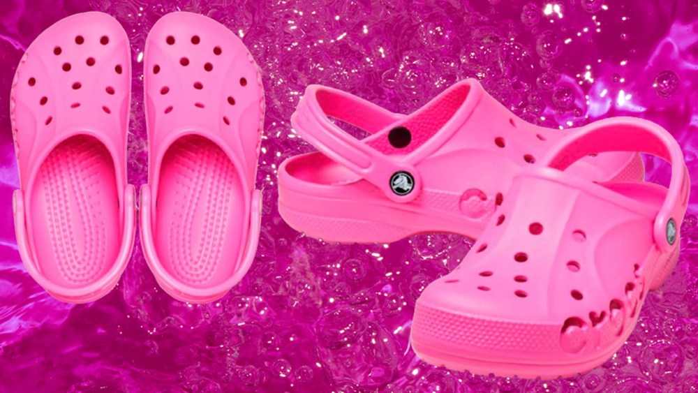 pink clog shoes over pink water background