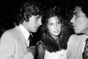 John Kennedy Jr., has tete-a-tete with girl friend, Meg.