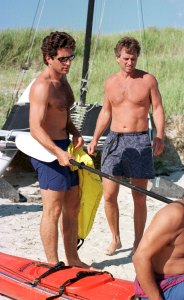 John F. Kennedy Jr. (1960 - 1999) and his cousin Robert F. Kennedy, Jr. prepare to go kayaking at the compound in Hyannis, Port Sunday 8/24/97.