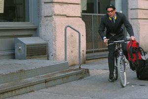 UNITED STATES - OCTOBER 22:  John F. Kennedy Jr. boards his bicycle outside his Tribecca home.