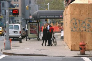 Newlyweds John F. Kennedy Jr. and wife Carolyn Bessette Kennedy kissing as they walk along Varick Street in Manhattan.,