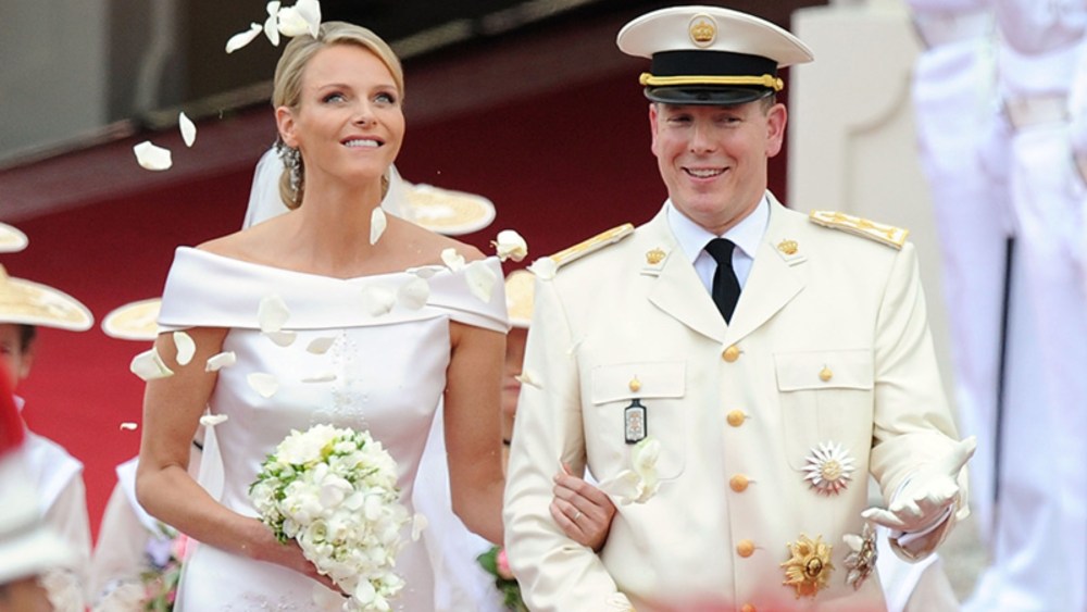 Princess Charlene of Monaco and Prince Albert Of Monaco smile as they leave the palace after the religious ceremony of the Royal Wedding of Prince Albert II of Monaco to Charlene Wittstock in the main courtyard at Prince's Palace on July 2, 2011 in Monaco, Monaco. The Roman-Catholic ceremony follows the civil wedding which was held in the Throne Room of the Prince's Palace of Monaco on July 1. With her marriage to the head of state of Principality of Monaco, Charlene Wittstock has become Princess consort of Monaco and gain the title, Princess Charlene of Monaco. Celebrations including concerts and firework displays are being held across several days, attended by a guest list of global celebrities and heads of state.