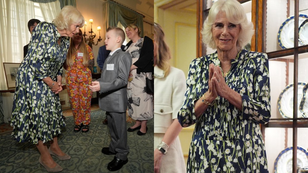 LONDON, ENGLAND - JULY 9: Queen Camilla meets with 10-year-old Literacy Champion Jayden Lowndes, from Stoke-on-Trent as she hosts community volunteers and authors to celebrate the National Literacy Trust charity's 30th anniversary at Clarence House on July 9, 2024 in London, England. (Photo by Yui Mok - WPA Pool/Getty Images)