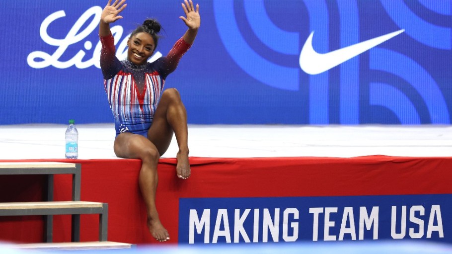Women athletes and Olympians like gymnast Simone Biles, pictured, are driving up the interest in sportswear, according to S&P.