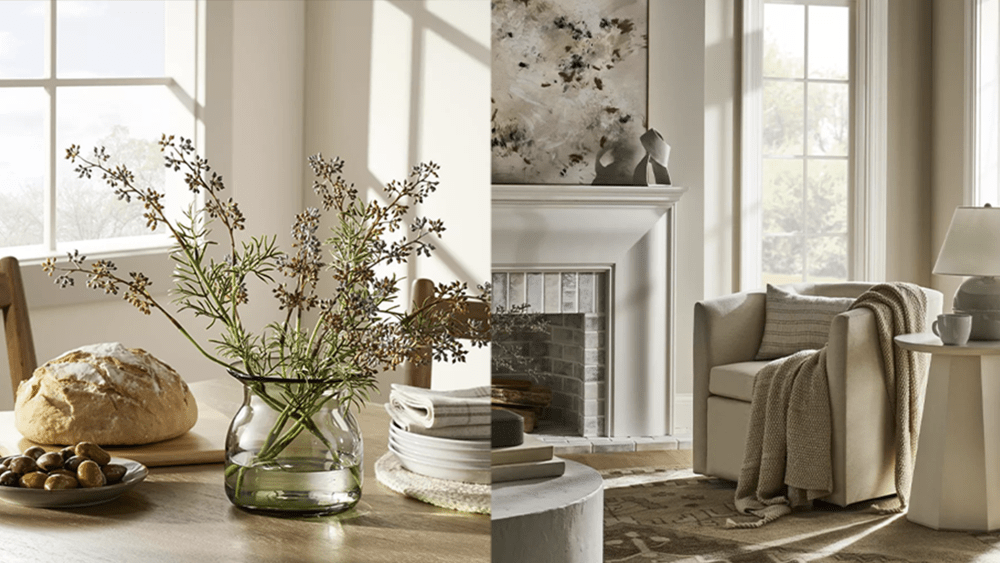 green vase with flowers on wood dinner table; living room setting