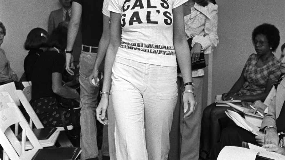 A t-shirt that reads 'Cal's Gal's' in the Calvin Klein resort 1974 ready to wear runway show.