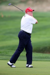 Former President Donald Trump follows his tee shot during the pro-am prior to the LIV Golf Invitational - Bedminster at Trump National Golf Club on August 10, 2023 in Bedminster, New Jersey.