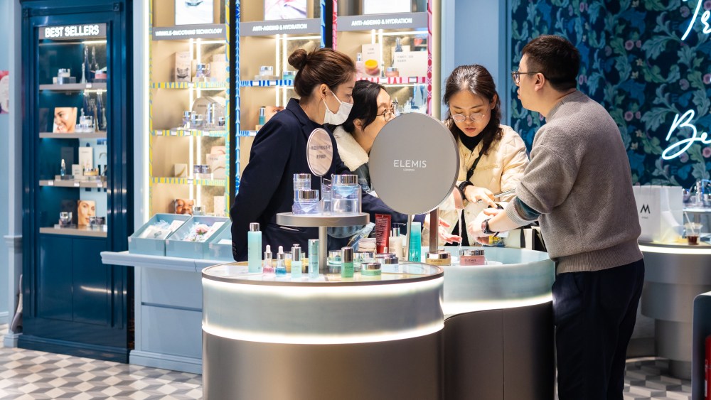 Chinese shoppers visiting a beauty counter at Deji Plaza, a luxury shopping mall in Nanjing, Jiangsu Province, China.
