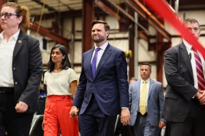 Republican vice presidential candidate, Sen. J.D. Vance (R-OH) walks with his wife Usha Vance to deliver a speach at NMC-Wollard Inc. / Wollard International on August 07, 2024 in Eau Claire, Wisconsin. Vance and Democratic presidential candidate, U.S. Vice President Kamala Harris are both set to speak at competing events in the same battleground state this week.