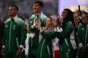 Saudi Arabia's athlete celebrate during the closing ceremony of the Paris 2024 Olympic Games at the Stade de France, in Saint-Denis, in the outskirts of Paris, on August 11, 2024.