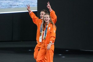 Harrie Lavreysen of the Netherlands, Femke Bol of the Netherlands walking off the podium during the Closing Ceremony of the Olympic Games Paris 2024 at Stade de France on August 11, 2024 in Paris, France.