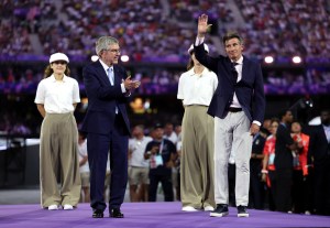 Thomas Bach, President of International Olympic Committee, applauds as Sebastian Coe, President of the IAAF, acknowledges the crowd during the Closing Ceremony of the Olympic Games Paris 2024 at Stade de France on August 11, 2024 in Paris, France.