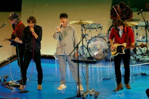 American Musician and Record Producer Ezra Koenig of Vampire Weekend performs with French Indie Rock Band Phoenix during the Closing Ceremony of the Olympic Games Paris 2024 at Stade de France on August 11, 2024 in Paris, France.