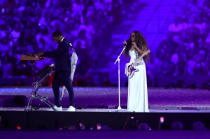 American Singer H.E.R. performs the National Anthem of the United States of America during the Closing Ceremony of the Olympic Games Paris 2024 at Stade de France on August 11, 2024 in Paris, France.