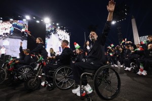 Italy's delegation parades at the Place de la Concorde during the Paris 2024 Paralympic Games Opening Ceremony in Paris on August 28, 2024.