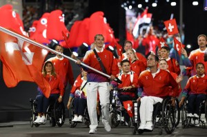 Switzerland's delegation parades at the Place de la Concorde during the Paris 2024 Paralympic Games Opening Ceremony in Paris on August 28, 2024.