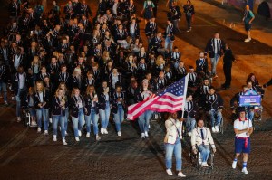 US' delegation parades on the Champs-Elysees avenue during the Paris 2024 Paralympic Games Opening Ceremony in Paris on August 28, 2024.