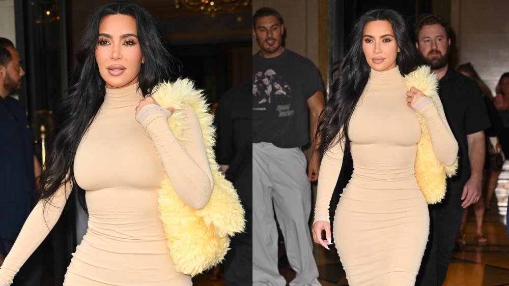 Kim Kardashian in New York on Aug. 15, beige bodycon dress, ERL, shearling purse, butter yellow