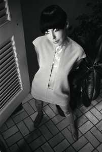 Model Peggy Moffitt wearing a short dress with clear plastic center panel from the spring/summer ’68 collection by Rudi Gernreich.