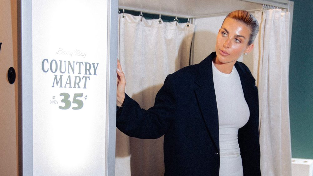 Paige Lorenze inside of the Dairy Boy Country Mart pop-up, influencer, apparel, accessories, home