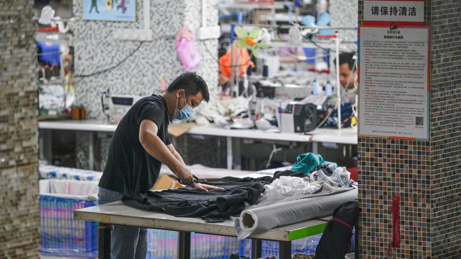 Workers producing garments at a textile factory that supplies clothes to fast fashion e-commerce company Shein.