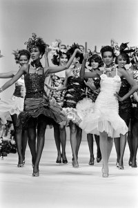 Mounia Orosemane, Iman, Dalma Callado, Amalia Vairelli, Sandy Bass, and other models on the runway at the Ungaro spring 1985 couture show, Paris.
