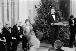 Helen Hayes, Jerome Robbins, Rudolf Serkin, Nancy Reagan, and Ronald Reagan (at podium) appear onstage during an event at the White House in Washington, D.C., on December 7, 1981.