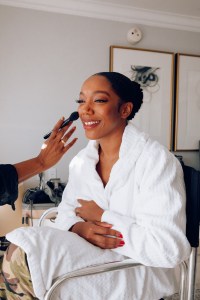 A look at Naomi Ackie getting ready for the LA premiere of Blink Twice.