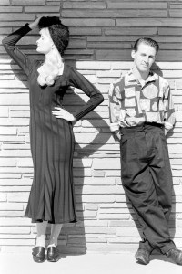 Todd Oldham and model in Oldham's black wide-ribbed cotton knit dress.
